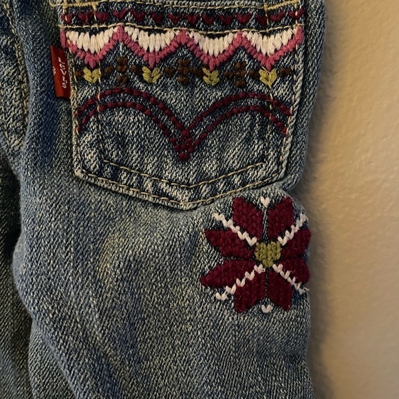 Levi’s  I adorable flower blue jeans. 12 months - Picture 5 of 10